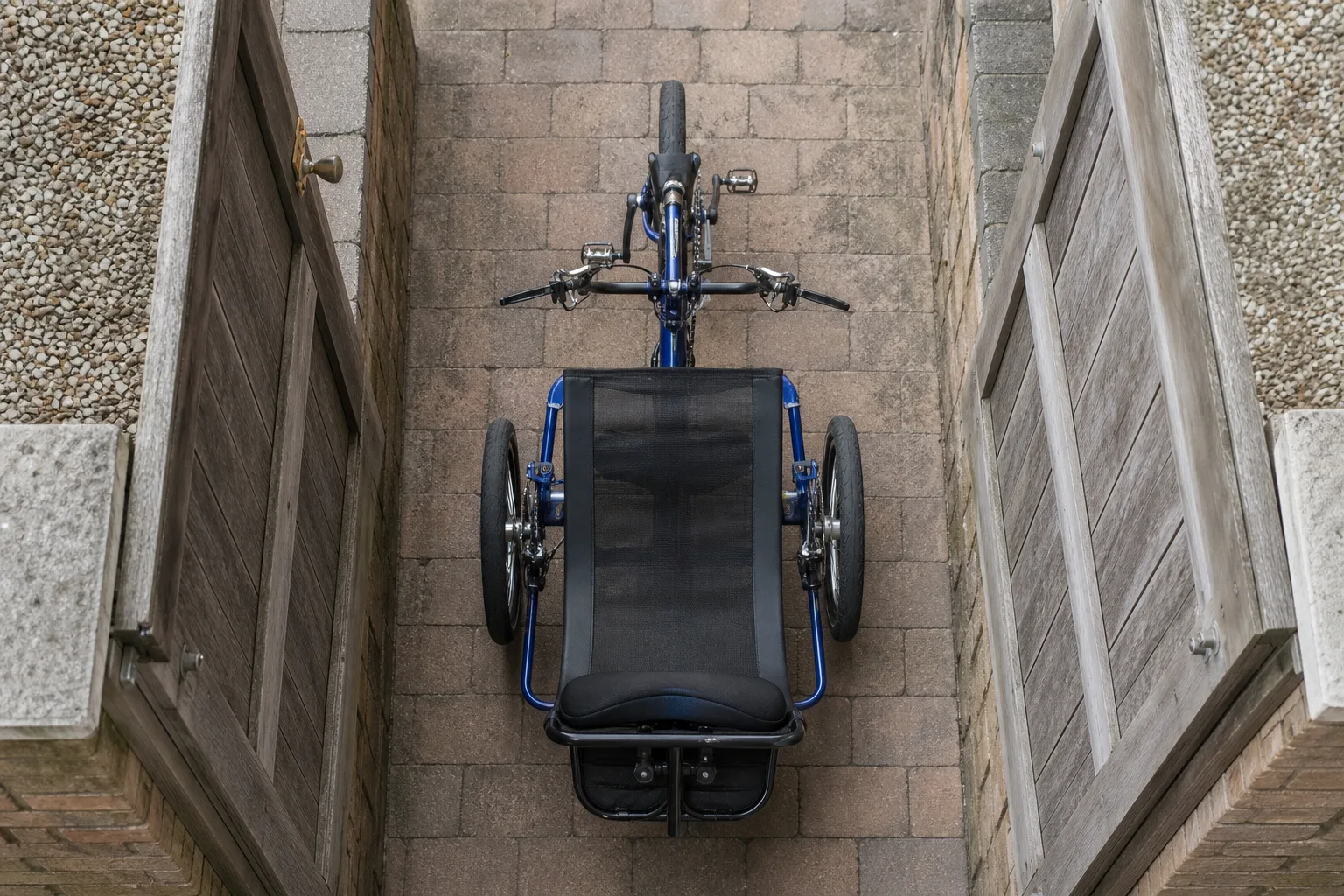 No garage, narrow gate, small car. Where will the trike actually live?